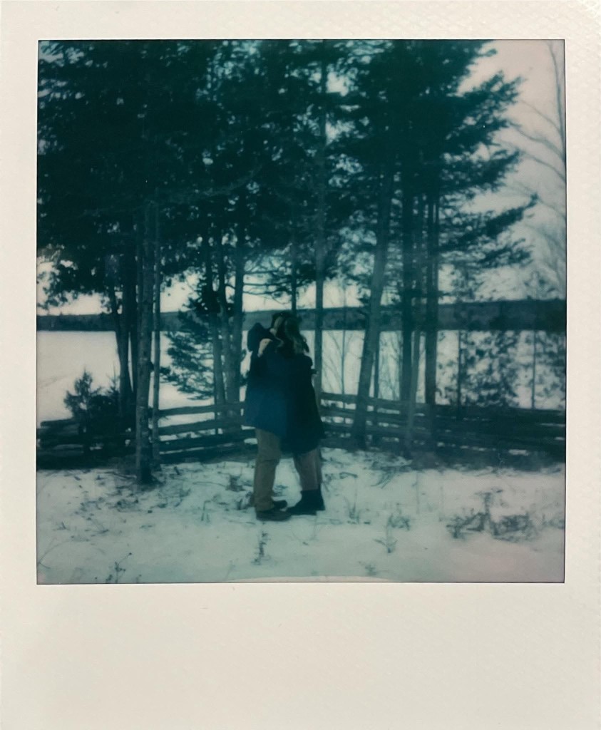 Misty and Adam by the water, in winter